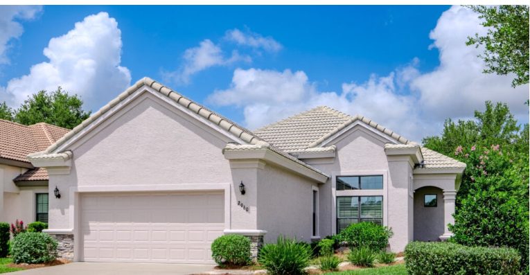 Modern Florida neighborhood street in Citrus County with single-family homes and trees.