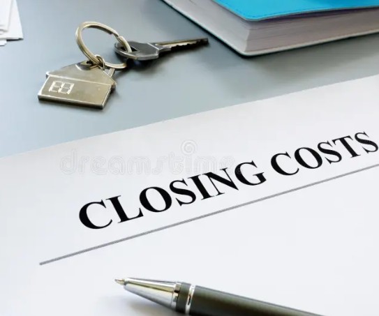 Closing costs Citrus County home buyers reviewing paperwork at closing