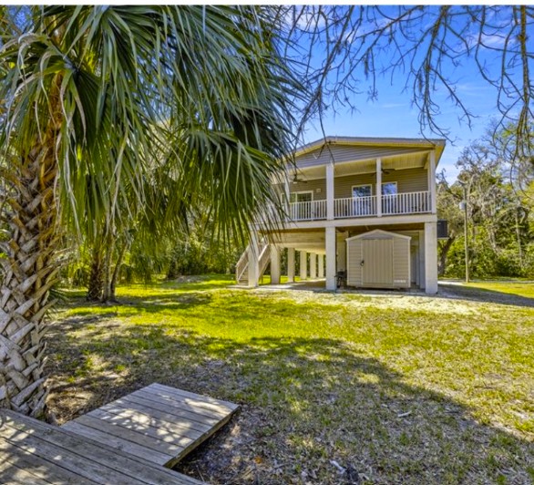 Elevated waterfront-style home in Citrus County Florida with raised construction